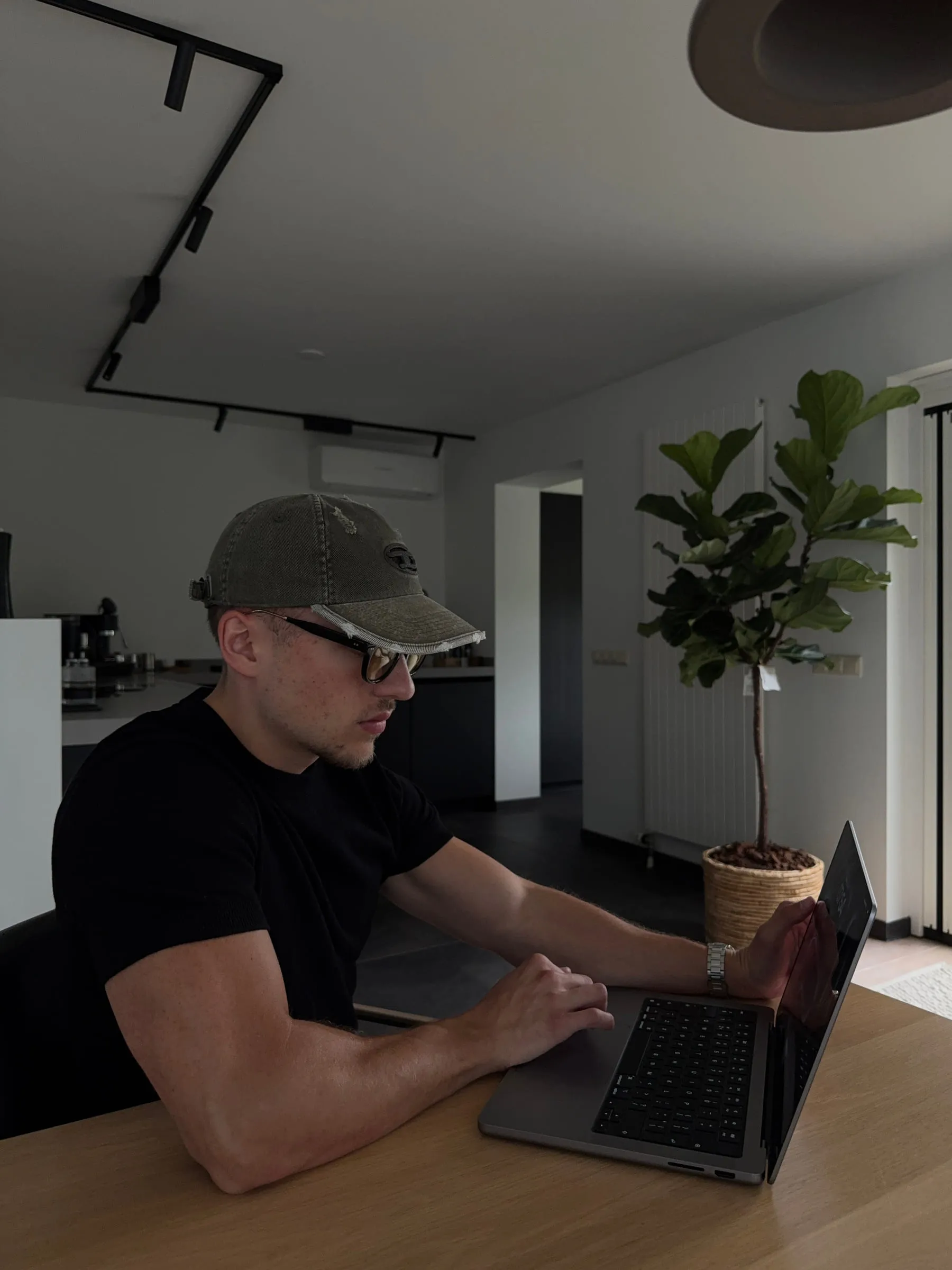 Daan working at his laptop